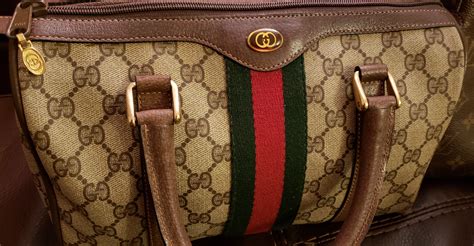 how do you know if a gucci bag is real|gucci purse real.